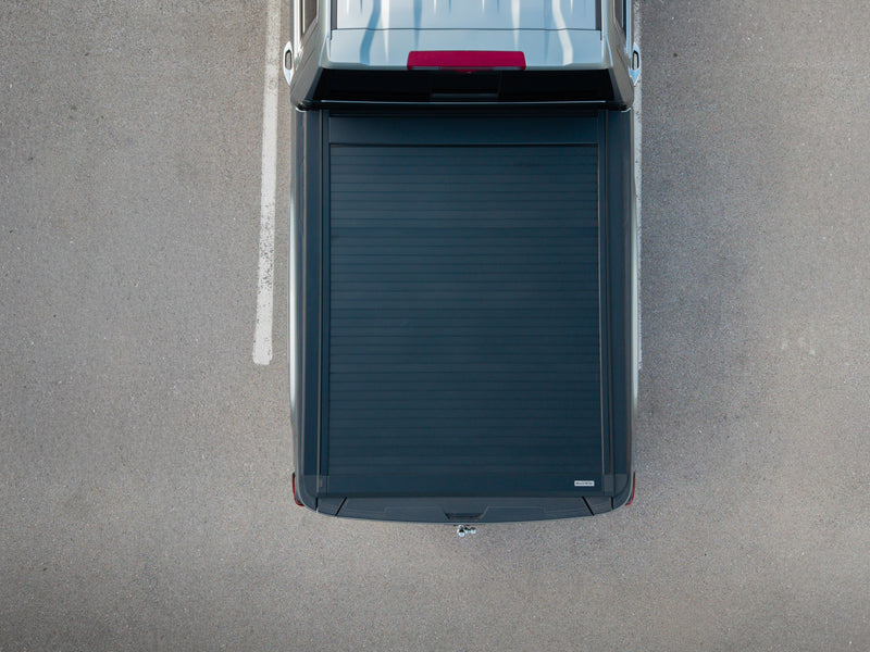 Top-down view of the low-profile SILVEX aluminum retractable tonneau cover