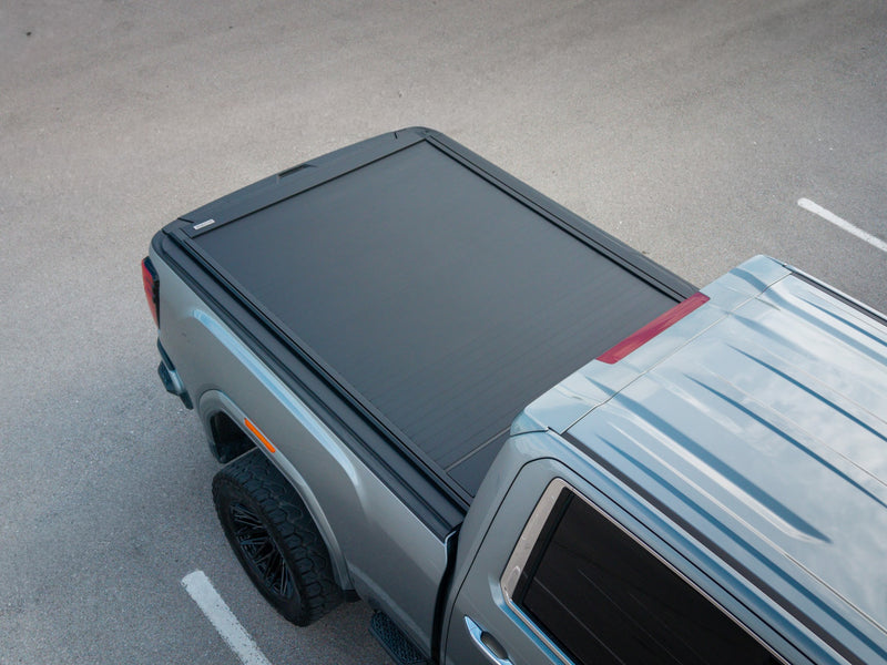 Close aerial view of the interlocking aluminum slats on the SILVEX tonneau cover
