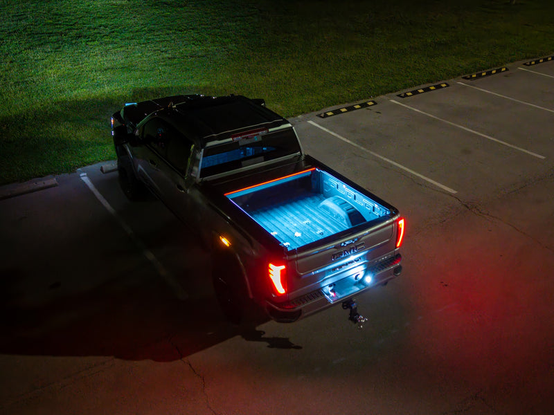 Built-in LED bed lighting at night with the SILVEX tonneau cover retracted open