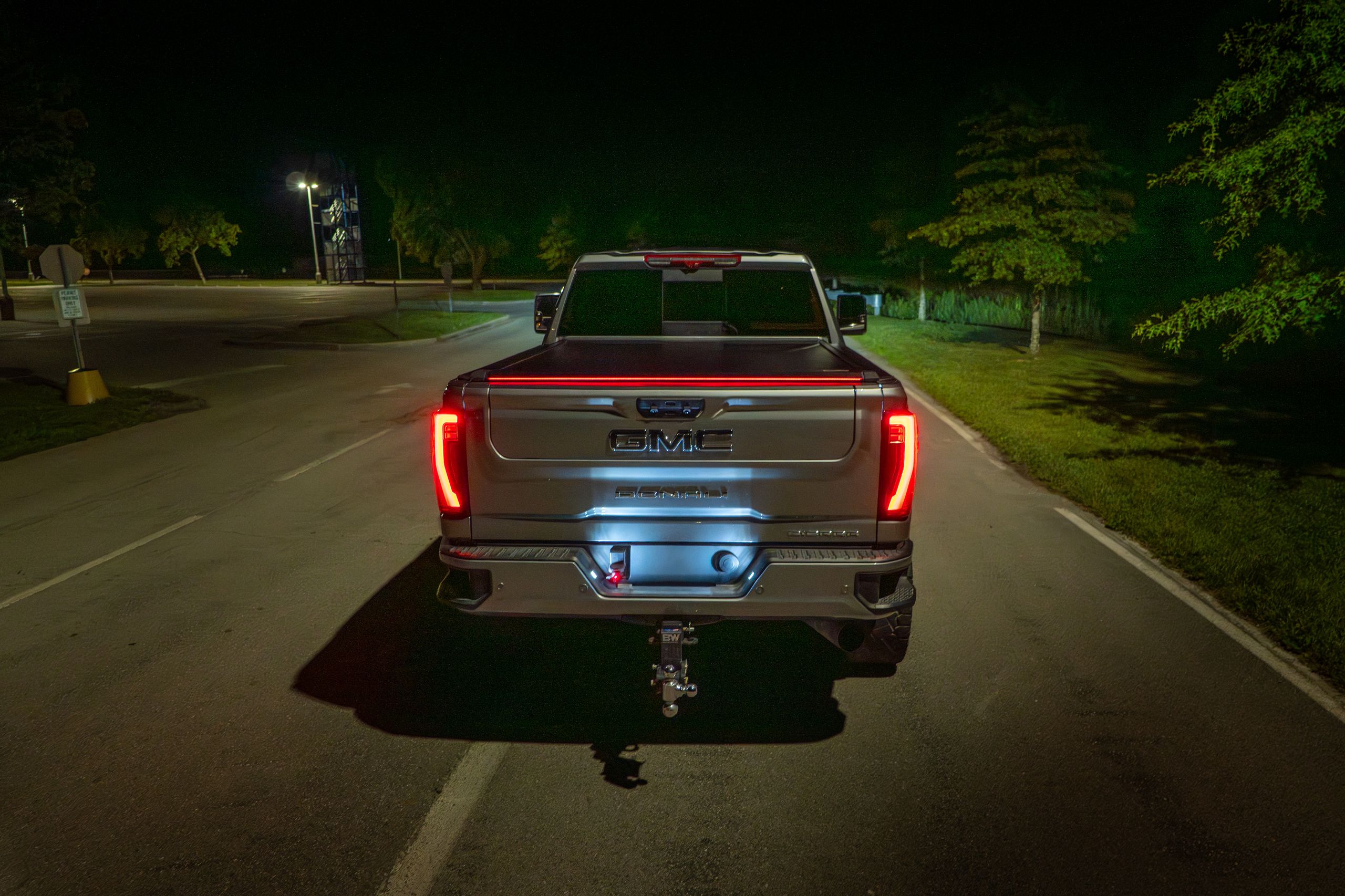 Truck at night with SILVEX red LED light bar glowing