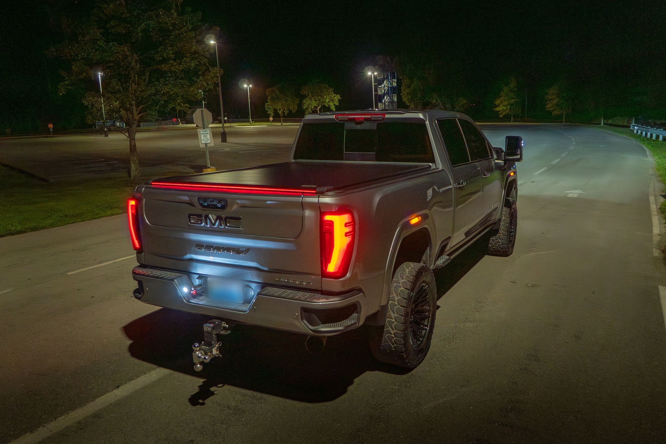 Truck at night with SILVEX red LED light bar glowing